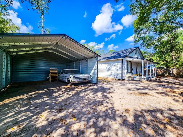 view of home's exterior with a carport