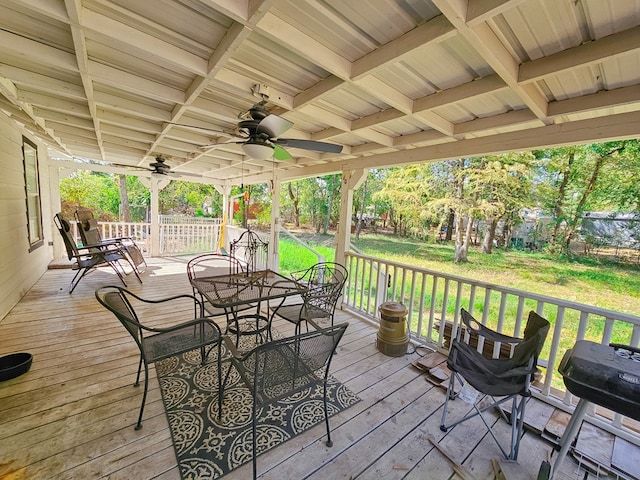 deck featuring a grill and ceiling fan