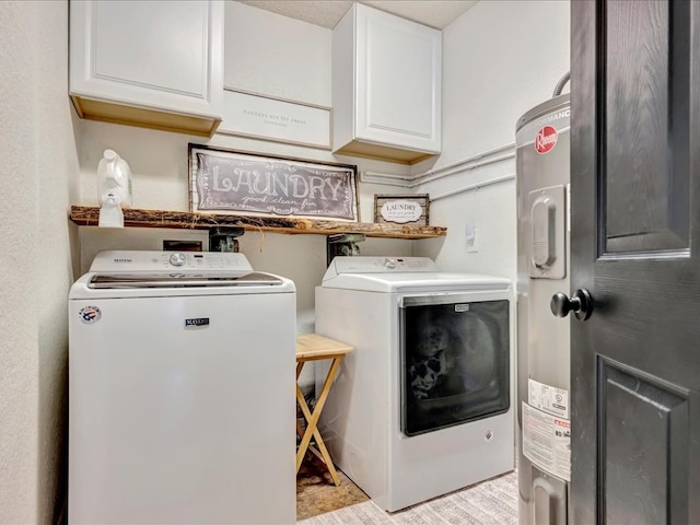 laundry area with washing machine and dryer and cabinet space