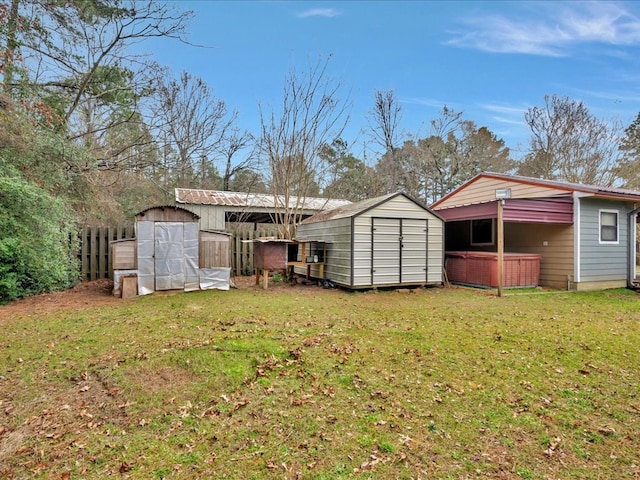 view of shed with a hot tub