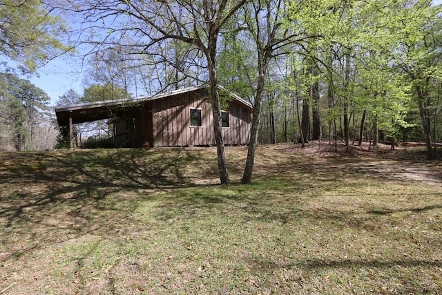 view of yard with a carport