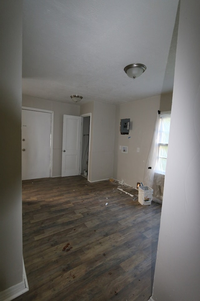 spare room featuring dark hardwood / wood-style flooring