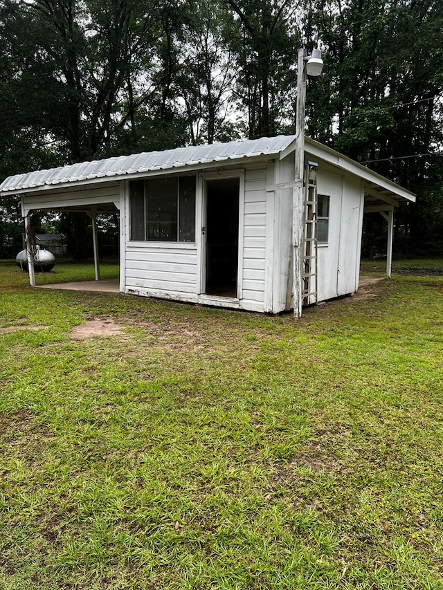 1418N Hendrix St, Diboll, TX 75941 - view of outdoor structure featuring an outbuilding