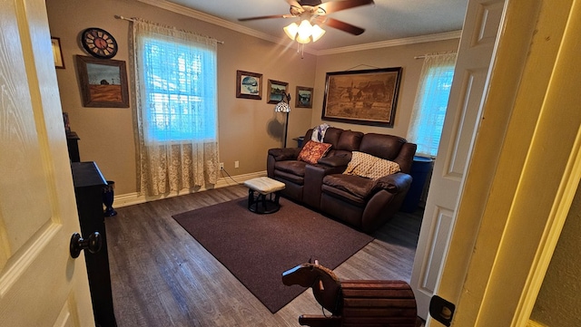 622 Egret Dr, Nacogdoches, TX 75964 - living room with wood finished floors, a ceiling fan, crown molding, and baseboards