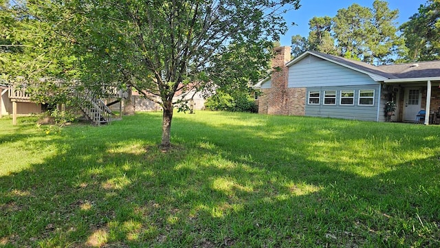 622 Egret Dr, Nacogdoches, TX 75964 - view of green lawn featuring stairs