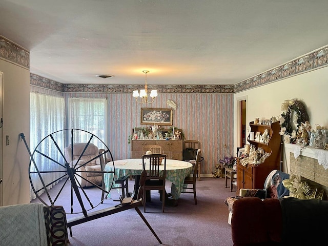 dining area with carpet and a notable chandelier