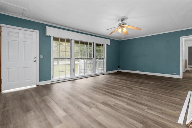 unfurnished living room featuring crown molding, ceiling fan, and wood-type flooring