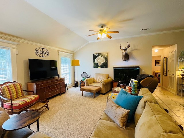 carpeted living room with vaulted ceiling, ceiling fan, and crown molding