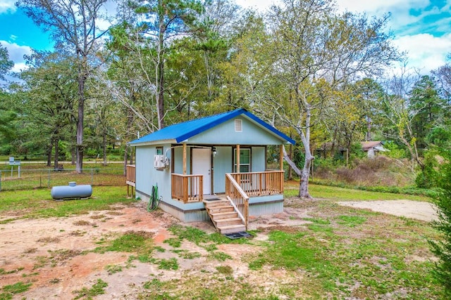 bungalow with an outdoor structure