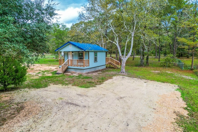 bungalow-style house featuring covered porch