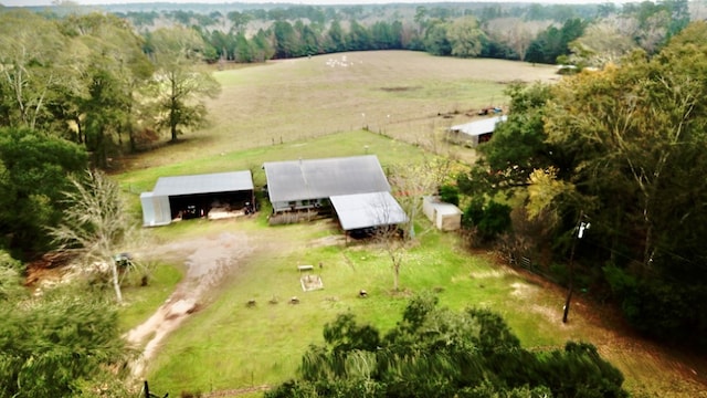 birds eye view of property featuring a rural view