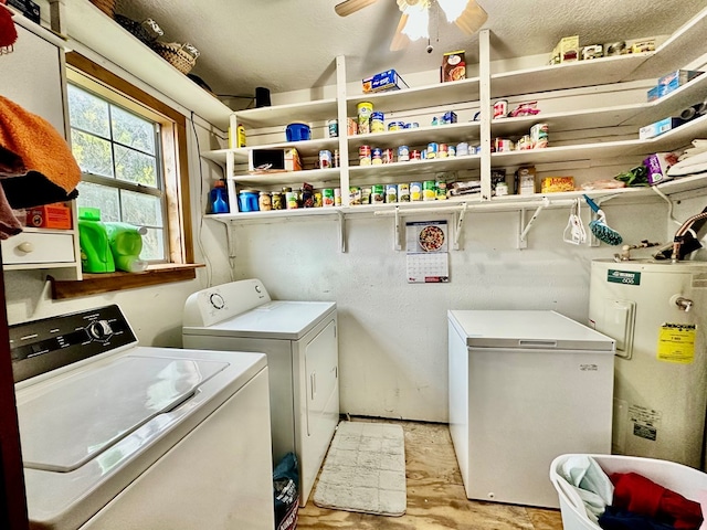 clothes washing area featuring separate washer and dryer, water heater, and ceiling fan