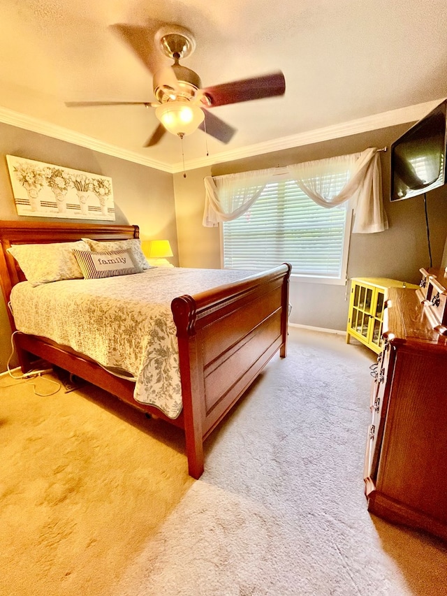 708 Card Dr, Lufkin, TX 75901 - carpeted bedroom featuring baseboards, ornamental molding, and a ceiling fan