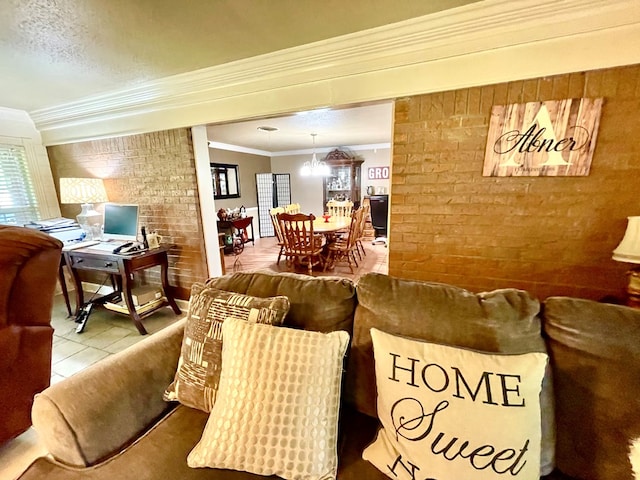 708 Card Dr, Lufkin, TX 75901 - living room featuring crown molding and brick wall