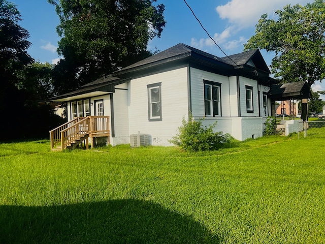 505 N 1st St, Lufkin, TX 75901 - back of house featuring a shingled roof