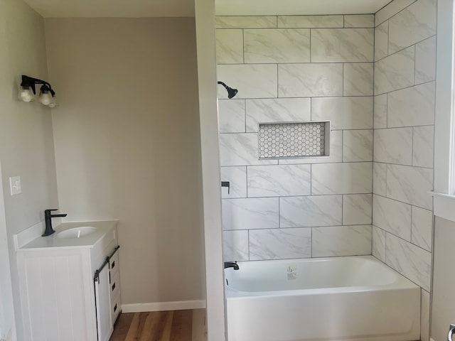 505 N 1st St, Lufkin, TX 75901 - full bathroom featuring vanity, wood finished floors, and bathing tub / shower combination