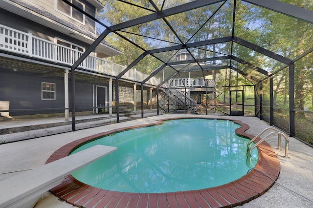 7332 Fm 252, Jasper, TX 75951 - swimming pool featuring a patio, a lanai, and a diving board
