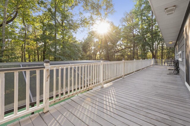7332 Fm 252, Jasper, TX 75951 - deck with view of wooded area
