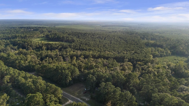 7332 Fm 252, Jasper, TX 75951 - aerial view of property and surrounding area with a heavily wooded area