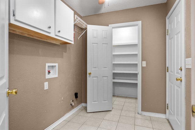 126 Lewellin Pl, Lufkin, TX 75904 - washroom with cabinet space, hookup for a washing machine, light tile patterned flooring, and ceiling fan