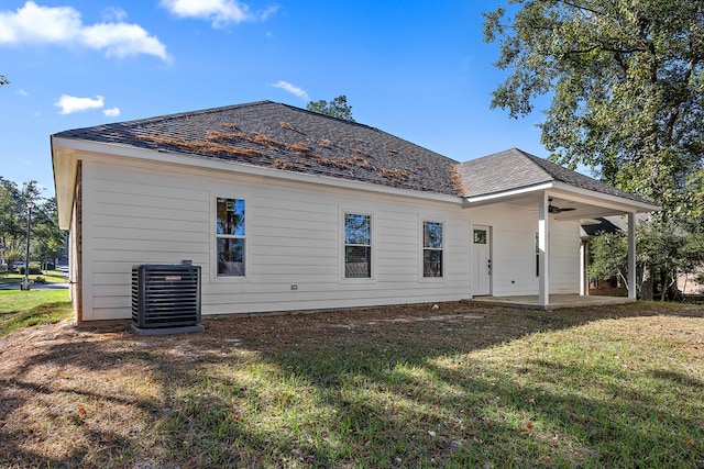 119 Park Pl, Lufkin, TX 75901 - rear view of house featuring a patio area, a yard, central AC, and a ceiling fan