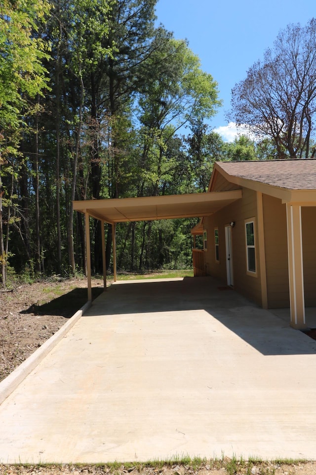 view of patio / terrace featuring a carport