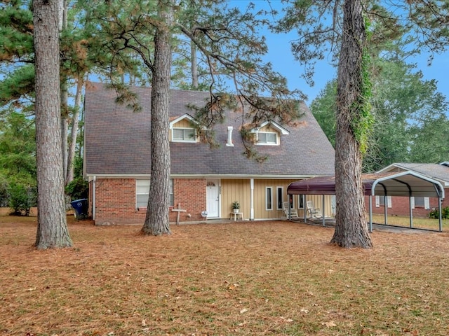 view of front of home with a carport