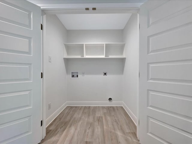 laundry room featuring hookup for an electric dryer, washer hookup, and light hardwood / wood-style floors