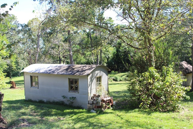 exterior space with a yard