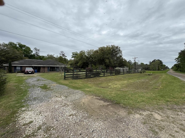 exterior space with gravel driveway