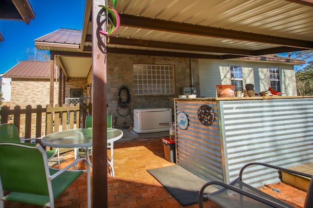view of patio featuring outdoor dining area