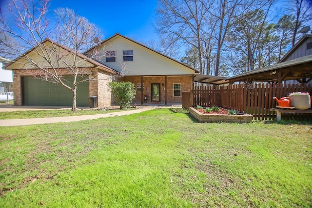 view of front of property with concrete driveway, an attached garage, fence, and a front yard