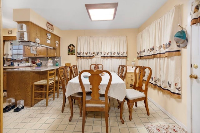 dining room with light tile patterned floors