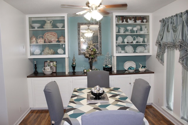 dining area featuring dark hardwood / wood-style flooring