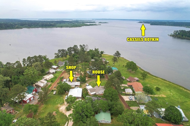 bird's eye view featuring a residential view and a water view