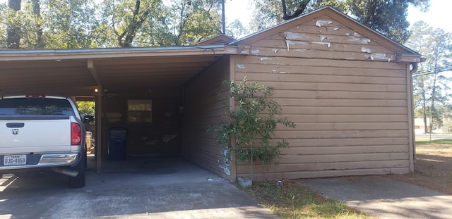 exterior space with a carport