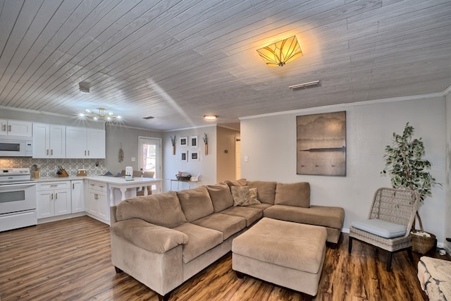 living area with visible vents, wooden ceiling, crown molding, and wood finished floors
