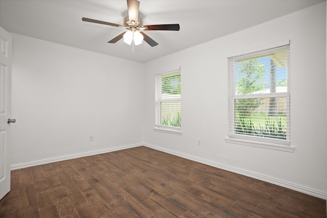 413 Linn St, Huntington, TX 75949 - empty room with dark wood-type flooring, ceiling fan, and baseboards
