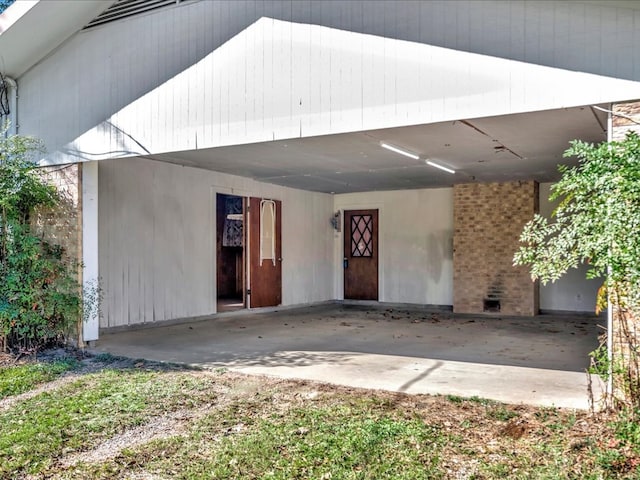 exterior space featuring a carport