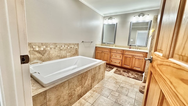 bathroom featuring a relaxing tiled tub, vanity, and crown molding