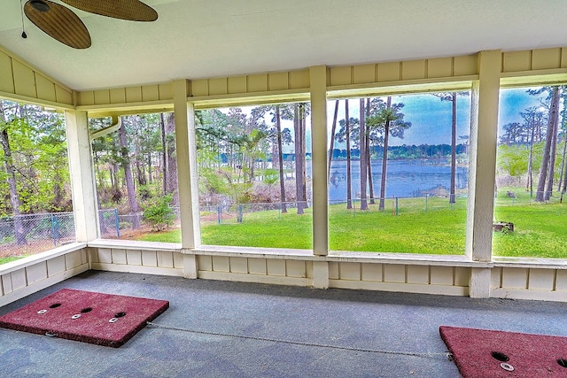 232 Cove Ln, Brookeland, TX 75931 - unfurnished sunroom with a water view, a ceiling fan, and lofted ceiling