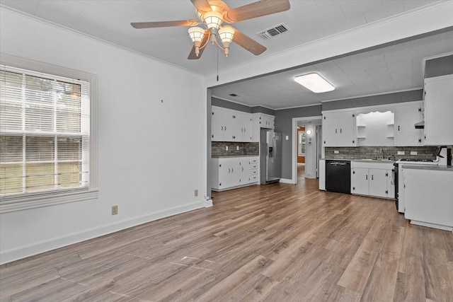 kitchen featuring dishwasher, stainless steel refrigerator with ice dispenser, white range, and white cabinetry