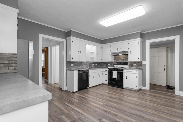 kitchen with white cabinetry, crown molding, black appliances, and dark hardwood / wood-style floors