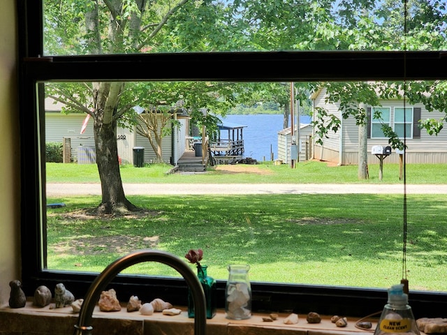 493 Hideaway Loop, Hemphill, TX 75948 - view of home's community with a water view and a yard