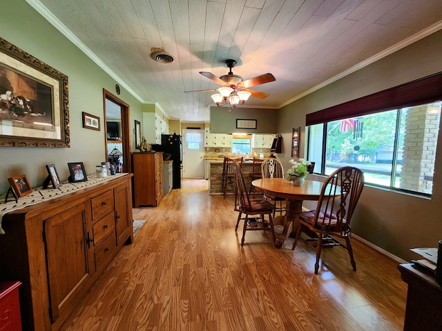 493 Hideaway Loop, Hemphill, TX 75948 - dining area with ornamental molding, light wood finished floors, a ceiling fan, and wood ceiling