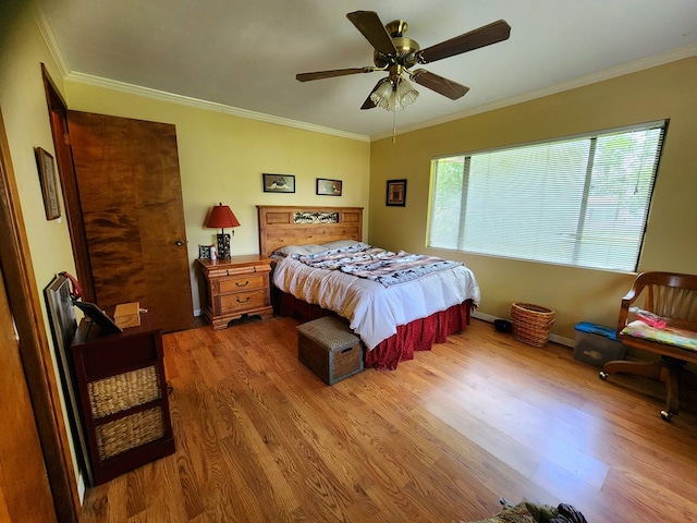 493 Hideaway Loop, Hemphill, TX 75948 - bedroom with wood finished floors, crown molding, a ceiling fan, and baseboards