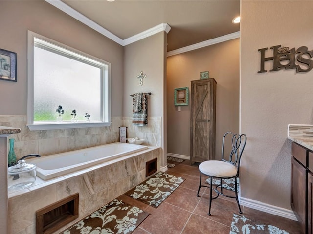 166 White Oak Ln, Lufkin, TX 75904 - bathroom with vanity, a garden tub, tile patterned flooring, and ornamental molding