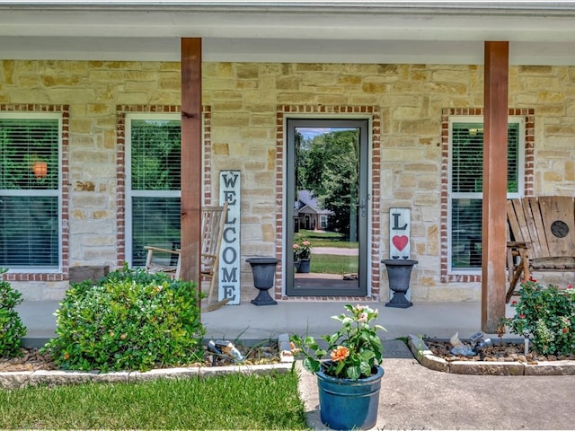 166 White Oak Ln, Lufkin, TX 75904 - entrance to property with a porch and stone siding