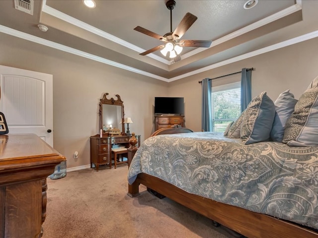 166 White Oak Ln, Lufkin, TX 75904 - bedroom featuring a raised ceiling, carpet flooring, ornamental molding, recessed lighting, and ceiling fan