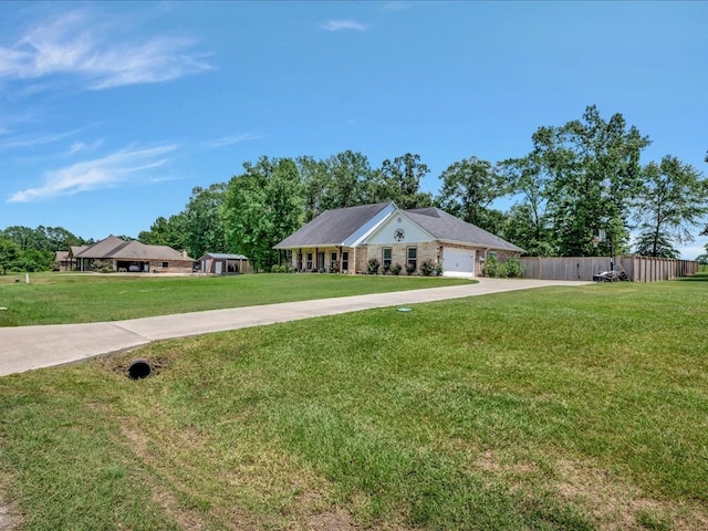 166 White Oak Ln, Lufkin, TX 75904 - ranch-style house featuring driveway and an attached garage